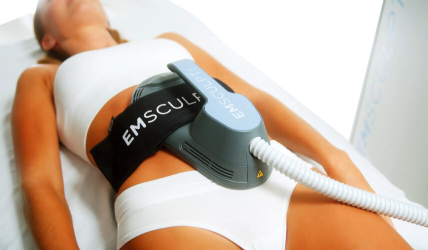 A person is getting their arms and legs waxed